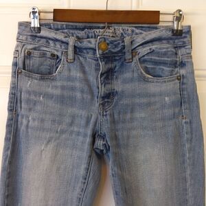 American Eaglel button front blue distressed stretch boy Jean  jeans